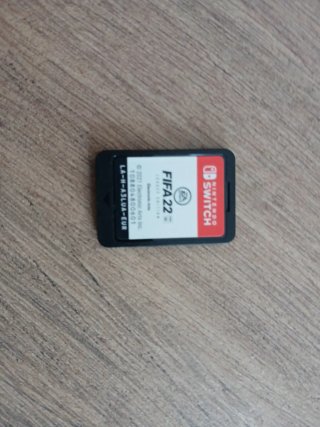 Nintendo Switch con mando y adaptador