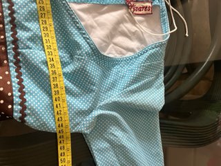 Traje de flamenca azul con detalles marrones