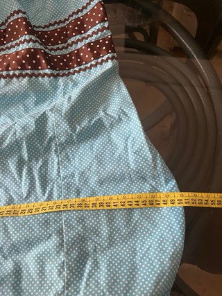 Traje de flamenca azul con detalles marrones