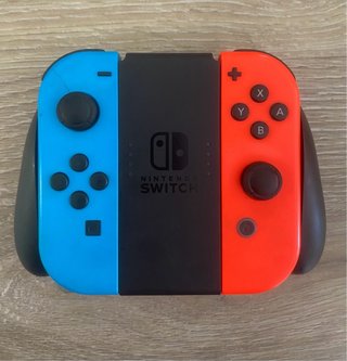 Nintendo Switch Azul/Rojo + Accesorios+ 1 Juego