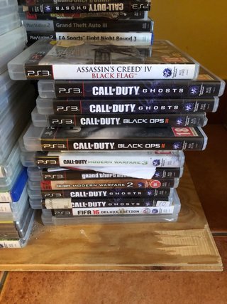 + de 100 videojuegos y cajas para Ps3 y Ps2