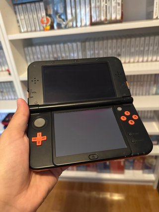 New nintendo 3Ds XL naranja + funda