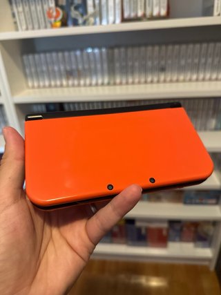 New nintendo 3Ds XL naranja + funda