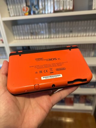New nintendo 3Ds XL naranja + funda