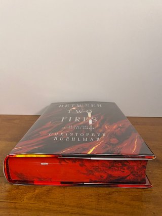 Between Two Fires Signed - Broken Binding