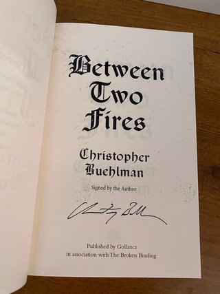 Between Two Fires Signed - Broken Binding