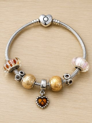 Pulsera Pandora Corazón y Abalorios