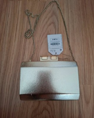 Bolso de fiesta dorado con cadena