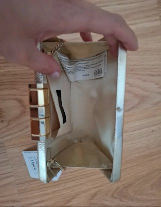 Bolso de fiesta dorado con cadena