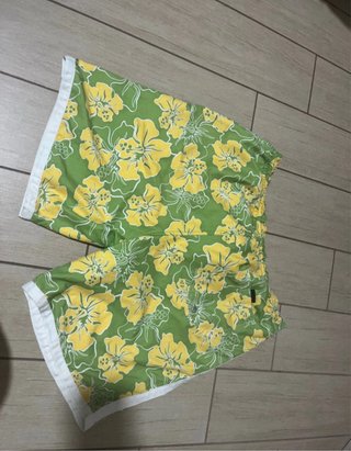 Arena costume verde fiori gialli