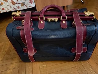 Borsa in pelle nera e bordeaux