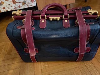 Borsa in pelle nera e bordeaux