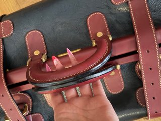 Borsa in pelle nera e bordeaux