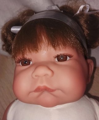 Muñeca Nica con coletas.