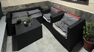 Conjunto terraza mesa y sofá exterior