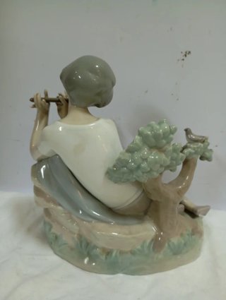 OFERTÓN Figura Lladró niño tocando flauta