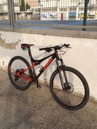 Bicicleta KTM Doble Suspensión Negra/Naranja
