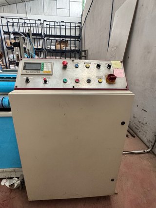 Máquina de extender y cortar tejido