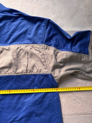Chaqueta deportiva Starter azul y gris