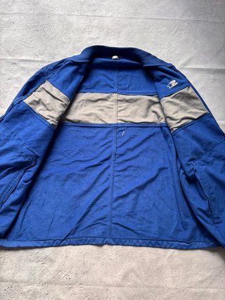 Chaqueta deportiva Starter azul y gris