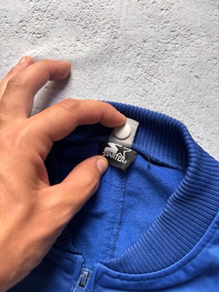 Chaqueta deportiva Starter azul y gris