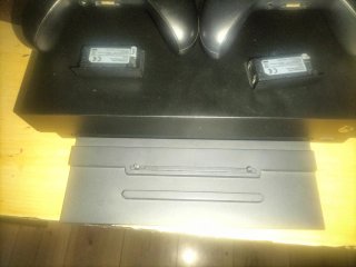 Xbox One X con 2 mandos y juegos