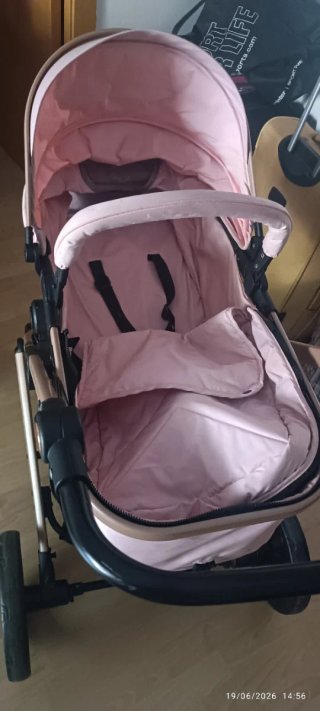 Carrito de bebé rosa  se puede negociar el precio