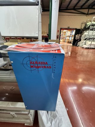 Máquina para enrollar y repasar tejido