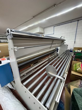 Máquina para enrollar y repasar tejido