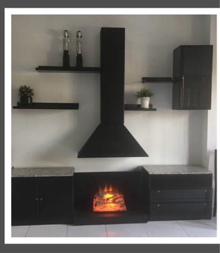 Módulos salón con chimenea decorativa