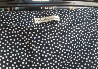 Pantaloni a pois neri e bianchi taglia 48