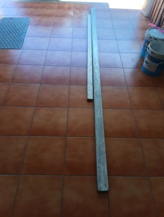 Regla de obra metálica