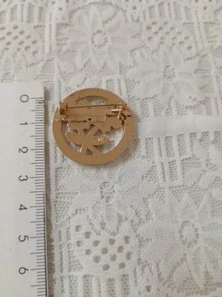 Spilla rotonda fiori strass oro e argento