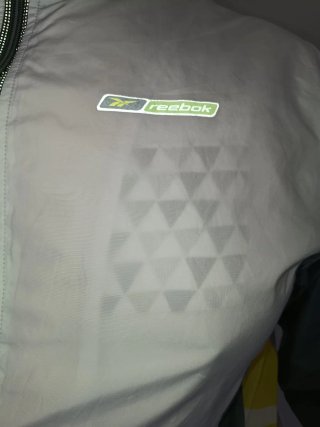 Giacca a vento Reebok vintage grigia e bianche