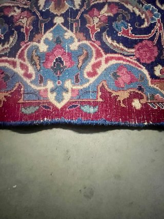 Alfombra de lana roja y azul