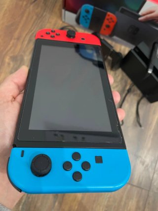 Nintendo Switch Azul/Rojo + Accesorios