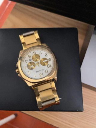 Reloj Skyline Dorado y Blanco