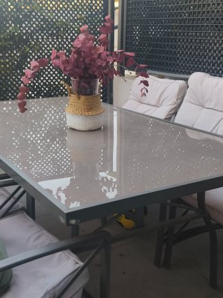 Conjunto de mesa y sillas de jardín.