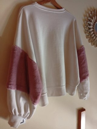 Sudadera Zara con mangas de pelo