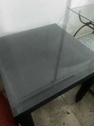 Mesa de terraza ratán y cristal