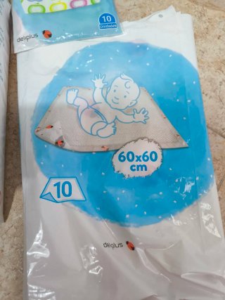 Protectores de cama y baberos desechables