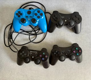 PS3 + 4 mandos + 7 juegos