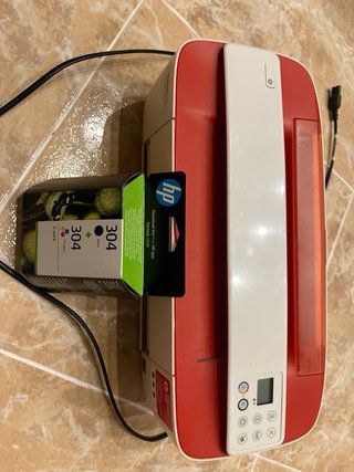 Impresora HP Roja. Cartuchos de regalo.