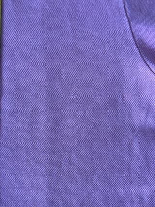 Polo rosa con detalles azules