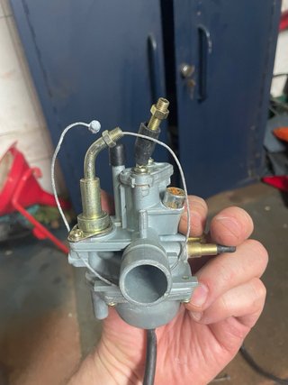 Lote de piezas para moto, manetas,carburadores.