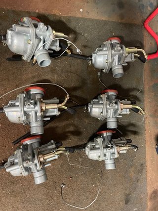 Lote de piezas para moto, manetas,carburadores.