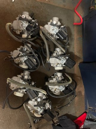 Lote de piezas para moto, manetas,carburadores.