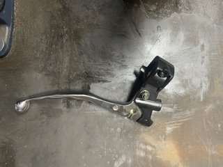 Lote de piezas para moto, manetas,carburadores.