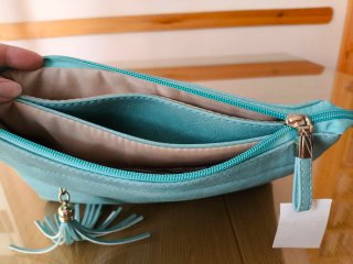 Bolso aguamarina con borla