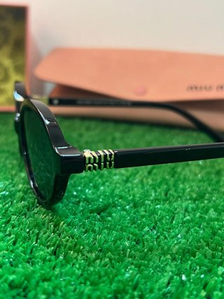 Gafas de sol Miu Miu negras